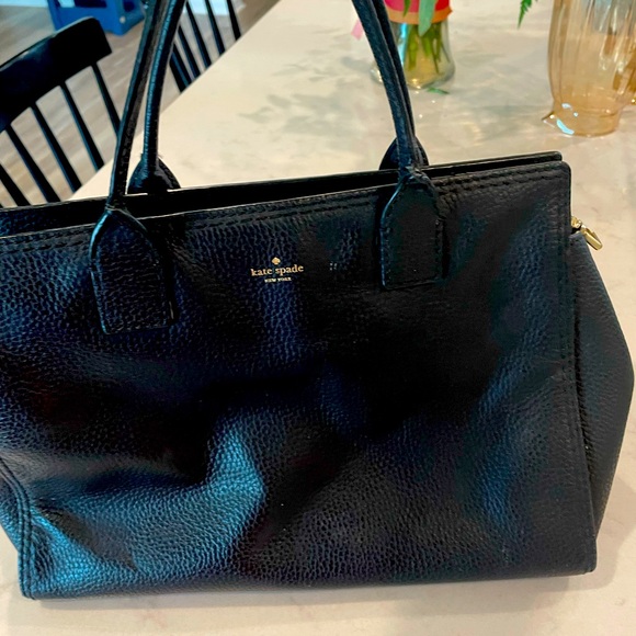 Kate Spade purse in like new condition. Black leather with no blemishes.